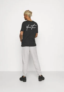 Soldes En Ligne YOURTURN UNISEX - Pantalon de survêtement trouser Normale all -YOURTURN Soldes 44af697d8af34693a7b3385401313f6d