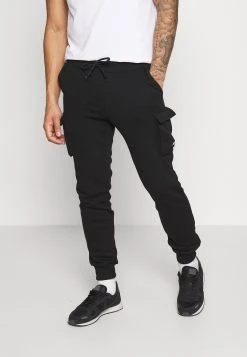 YOURTURN UNISEX - Pantalon de survêtement En promotion trouser Normale all